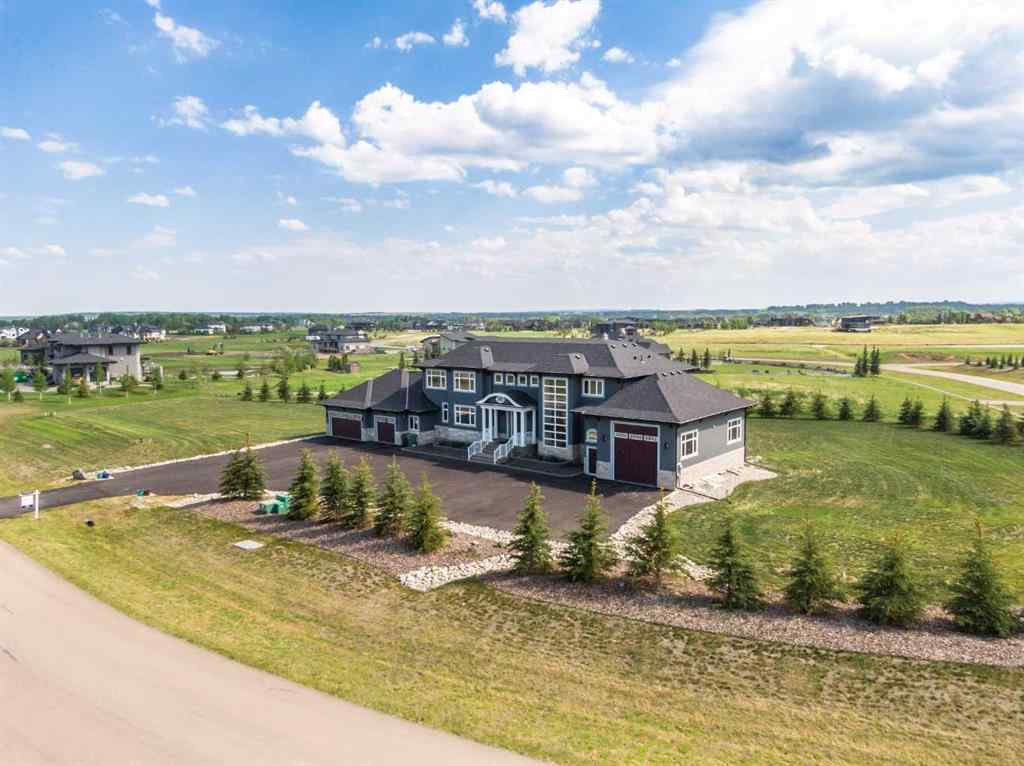 MLS® A2229641 - 31103 Windhorse Drive  in Windhorse Manor Rural Rocky View County, Residential