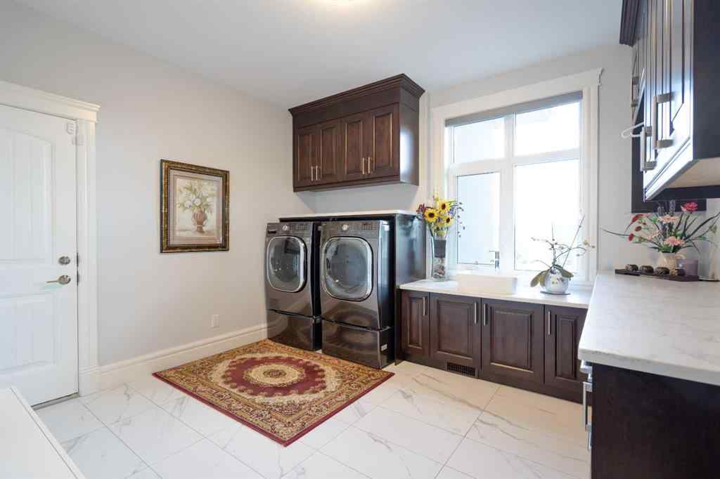 MLS® A2229641 - 31103 Windhorse Drive  in Windhorse Manor Rural Rocky View County, Residential