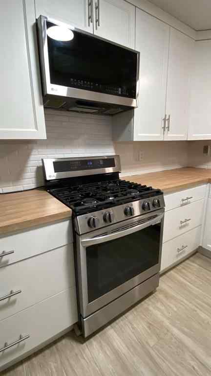 MLS® A2229707 - 5203 42 Street  in Westwood Innisfail, Residential