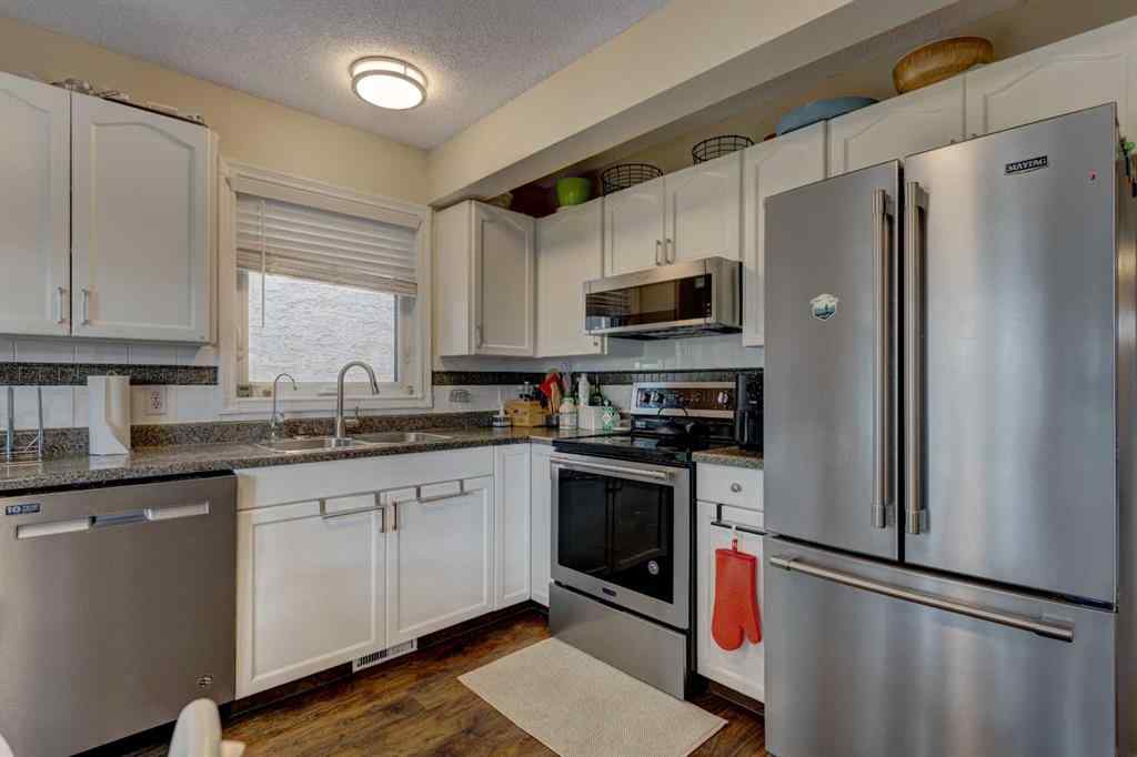 MLS® A2230017 - 211 Christie Park Mews SW in Christie Park Calgary, Residential
