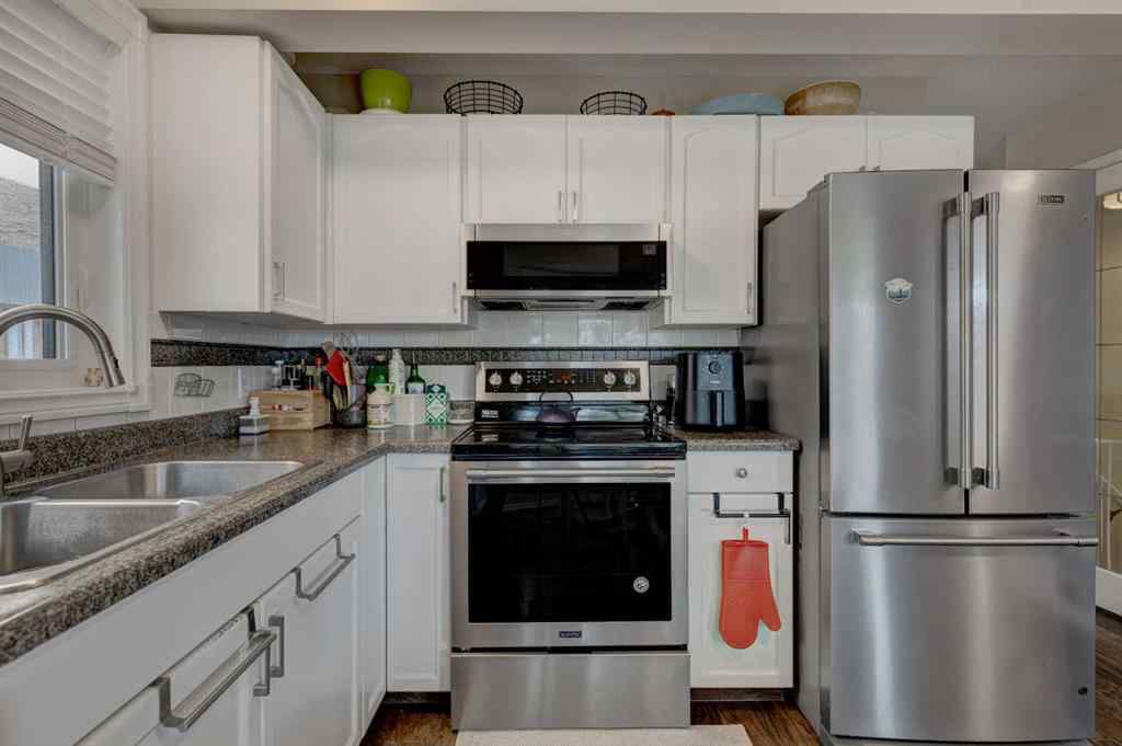 MLS® A2230017 - 211 Christie Park Mews SW in Christie Park Calgary, Residential
