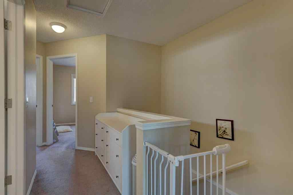 MLS® A2230017 - 211 Christie Park Mews SW in Christie Park Calgary, Residential