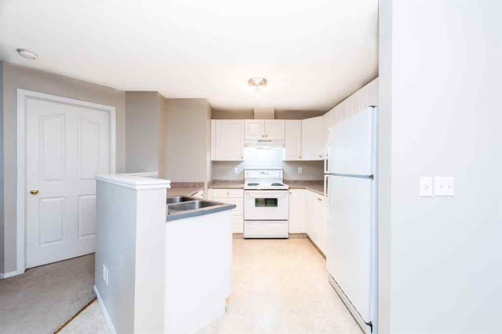 MLS® A2230134 - Unit #1403 604 8 Street SW in Downtown Airdrie, Residential