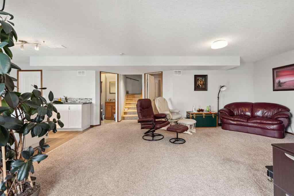 MLS® A2230277 - 16 Bow Ridge Drive  in Bow Ridge Cochrane, Residential