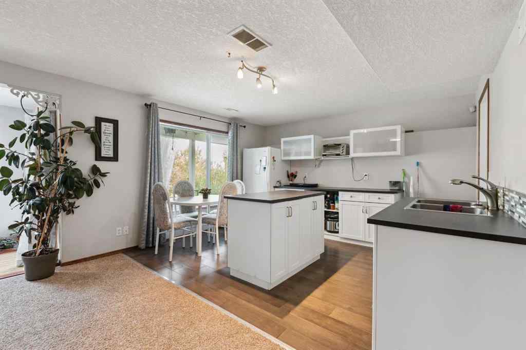 MLS® A2230277 - 16 Bow Ridge Drive  in Bow Ridge Cochrane, Residential