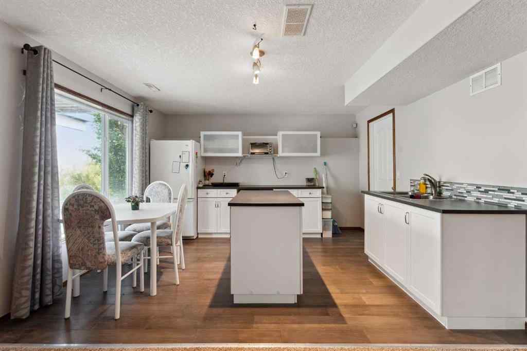 MLS® A2230277 - 16 Bow Ridge Drive  in Bow Ridge Cochrane, Residential
