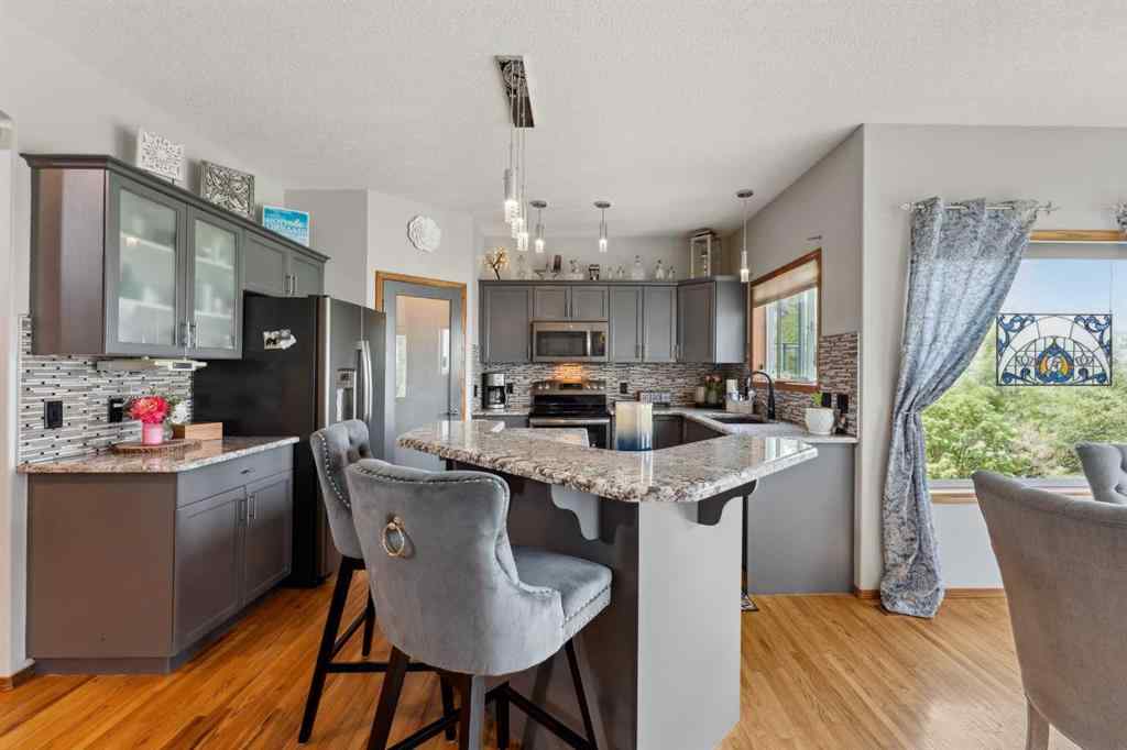 MLS® A2230277 - 16 Bow Ridge Drive  in Bow Ridge Cochrane, Residential
