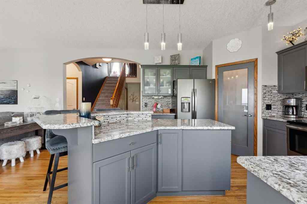MLS® A2230277 - 16 Bow Ridge Drive  in Bow Ridge Cochrane, Residential