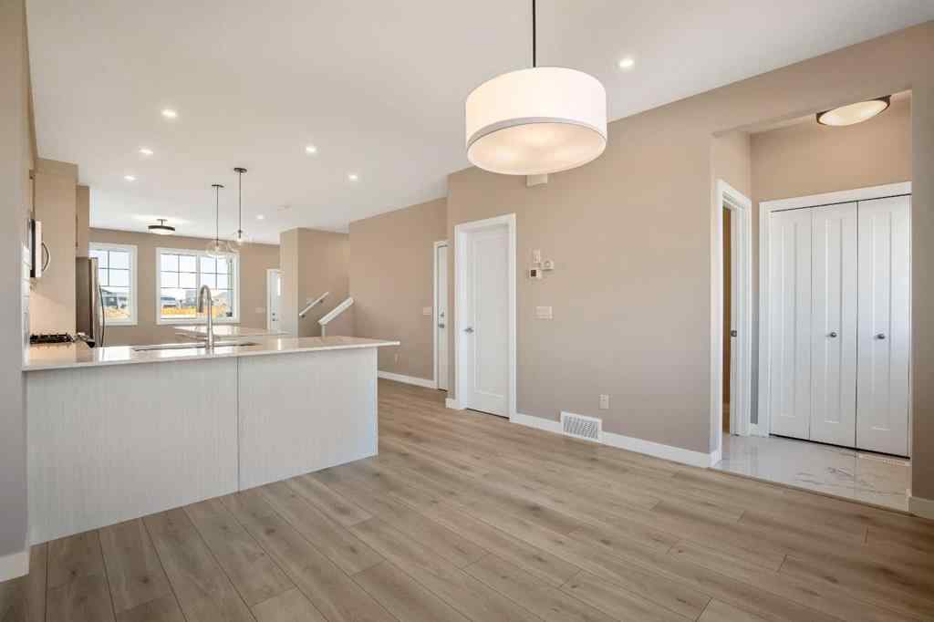 MLS® A2230445 - 53 Creekstone Drive SW in Pine Creek Calgary, Residential