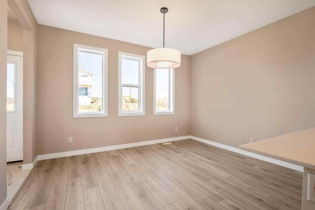 MLS® A2230445 - 53 Creekstone Drive SW in Pine Creek Calgary, Residential