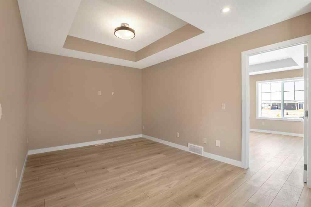 MLS® A2230445 - 53 Creekstone Drive SW in Pine Creek Calgary, Residential