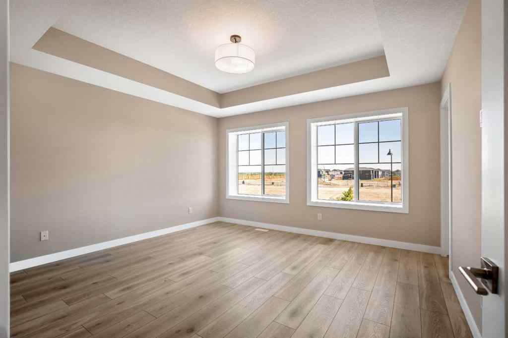 MLS® A2230445 - 53 Creekstone Drive SW in Pine Creek Calgary, Residential