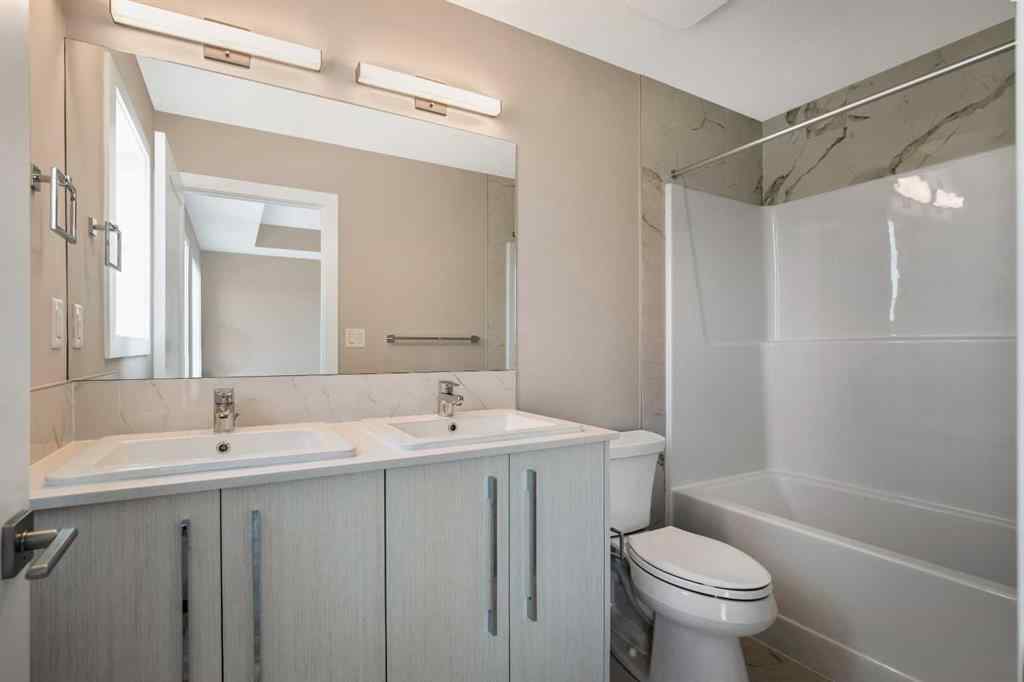 MLS® A2230445 - 53 Creekstone Drive SW in Pine Creek Calgary, Residential