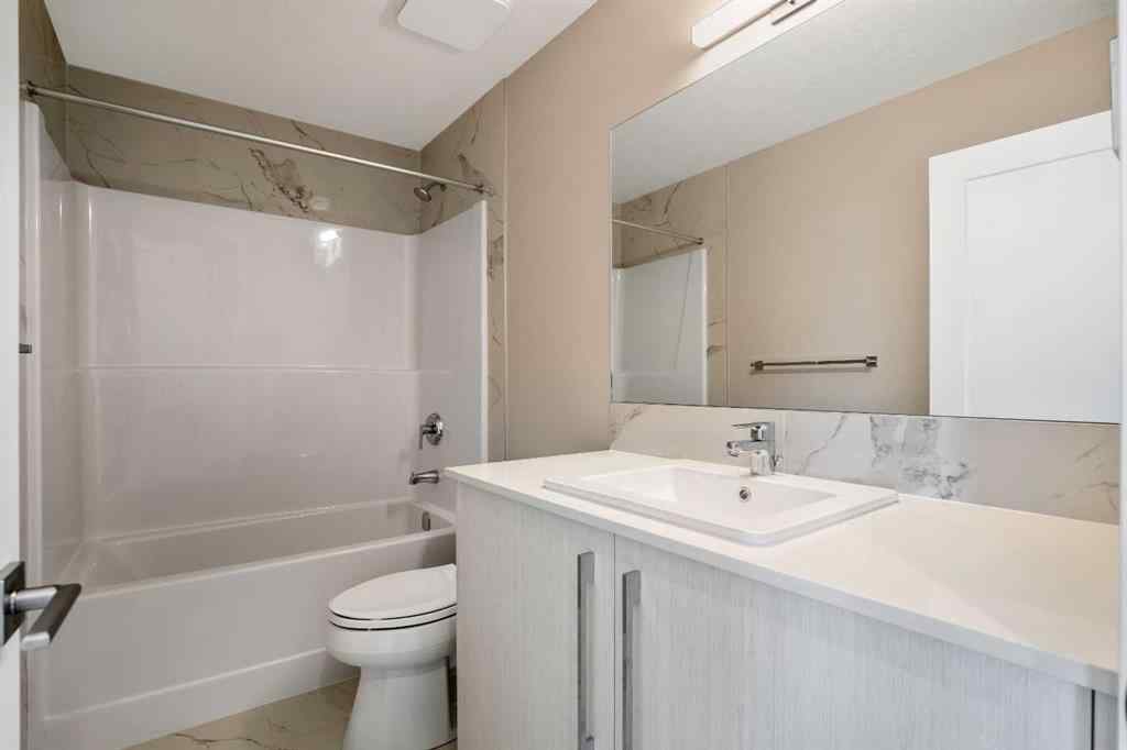 MLS® A2230445 - 53 Creekstone Drive SW in Pine Creek Calgary, Residential