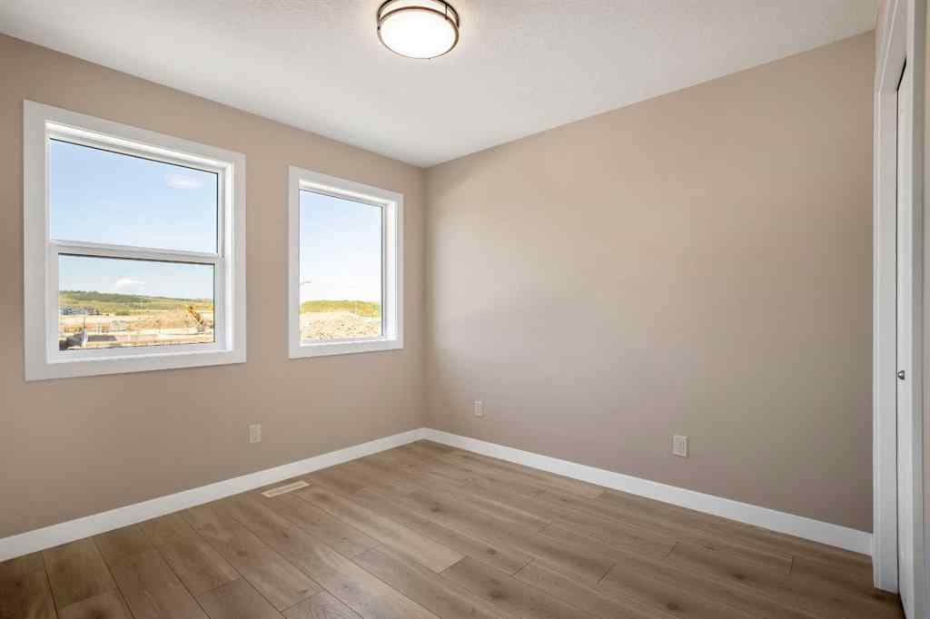 MLS® A2230445 - 53 Creekstone Drive SW in Pine Creek Calgary, Residential