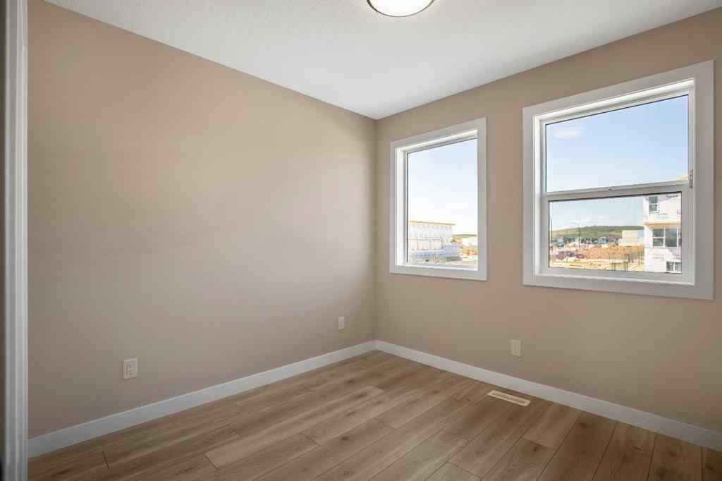 MLS® A2230445 - 53 Creekstone Drive SW in Pine Creek Calgary, Residential