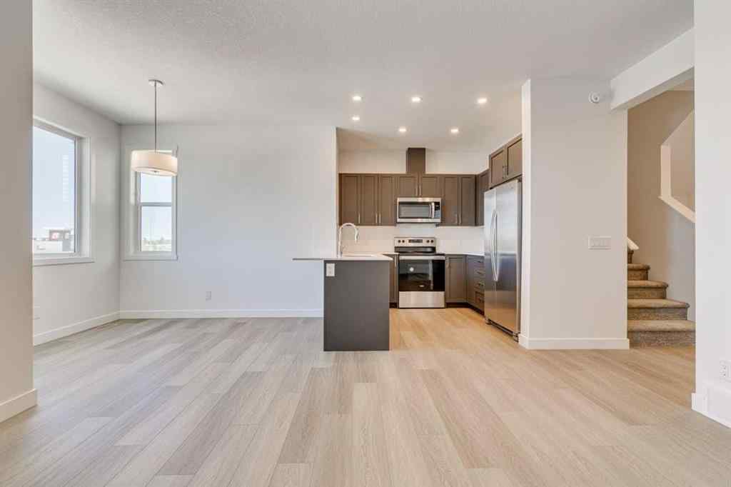 MLS® A2230611 - Unit #406 65 Belvedere Pointe SE in Belvedere Calgary, Residential