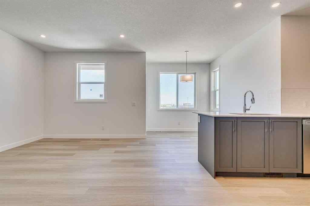 MLS® A2230611 - Unit #406 65 Belvedere Pointe SE in Belvedere Calgary, Residential