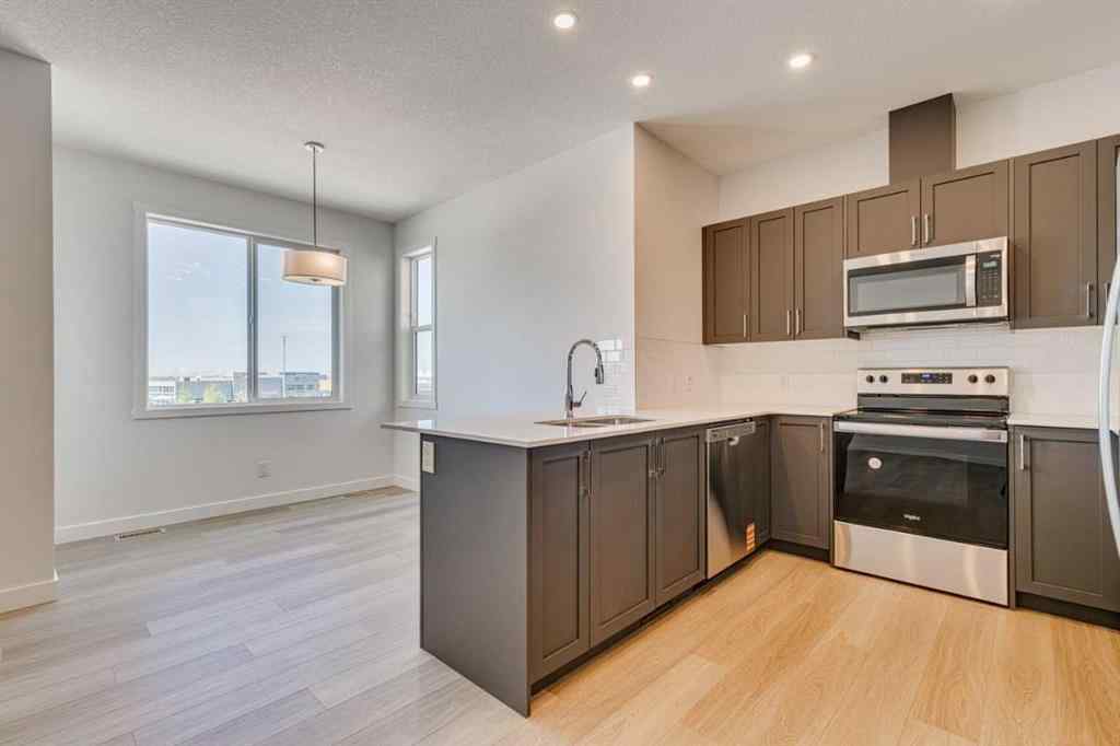 MLS® A2230611 - Unit #406 65 Belvedere Pointe SE in Belvedere Calgary, Residential