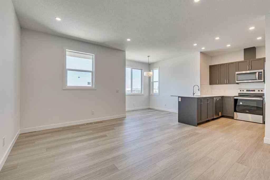 MLS® A2230611 - Unit #406 65 Belvedere Pointe SE in Belvedere Calgary, Residential