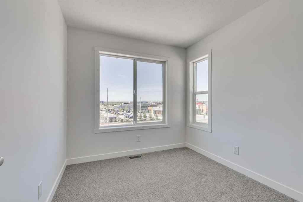 MLS® A2230611 - Unit #406 65 Belvedere Pointe SE in Belvedere Calgary, Residential