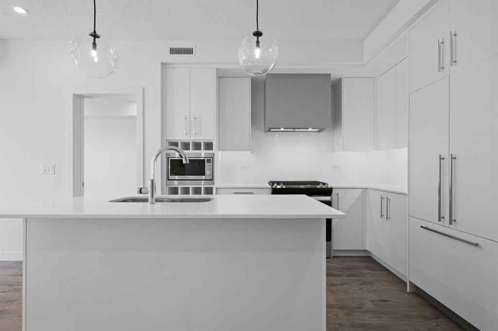 MLS® A2230875 - Unit #204 8370 Broadcast Avenue SW in West Springs Calgary, Residential