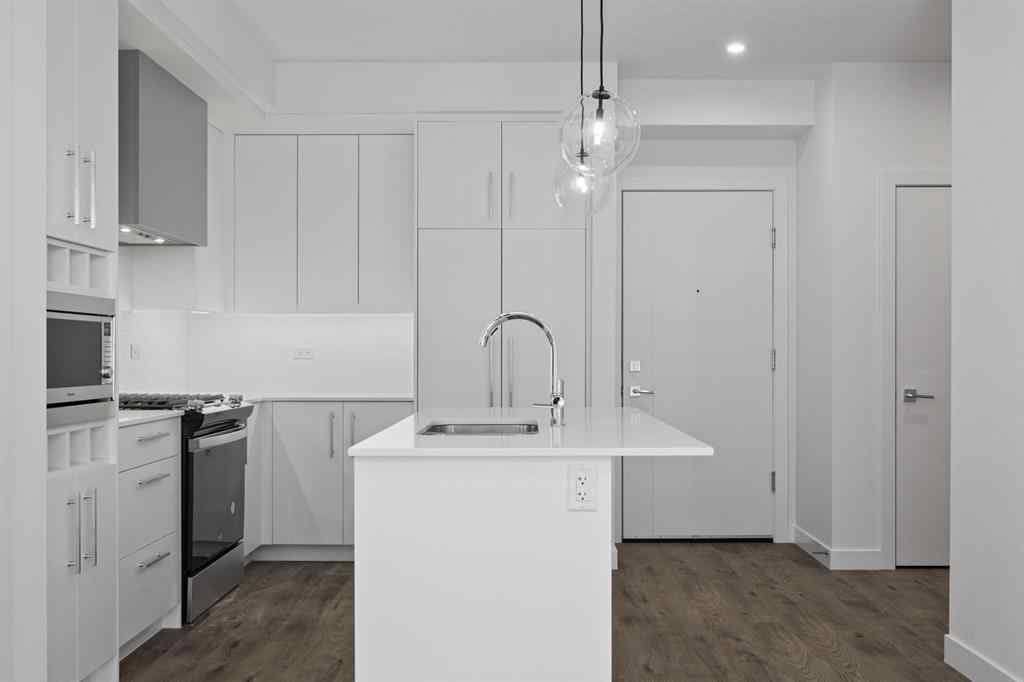 MLS® A2230875 - Unit #204 8370 Broadcast Avenue SW in West Springs Calgary, Residential
