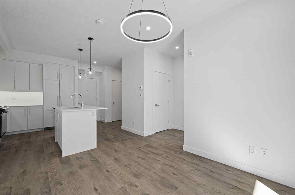 MLS® A2230875 - Unit #204 8370 Broadcast Avenue SW in West Springs Calgary, Residential