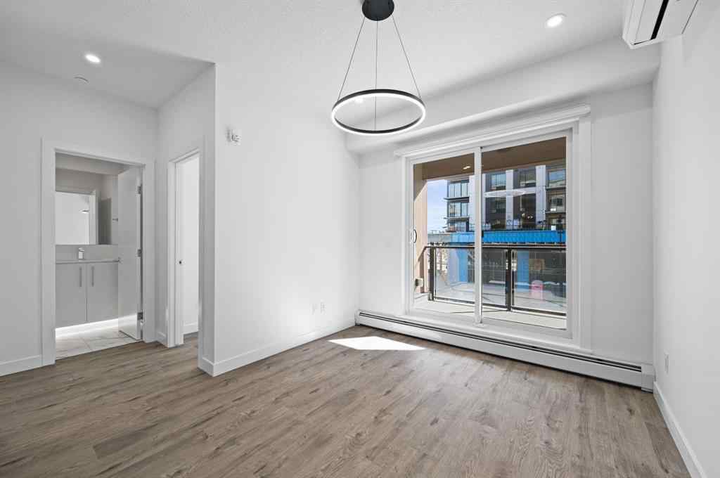MLS® A2230875 - Unit #204 8370 Broadcast Avenue SW in West Springs Calgary, Residential