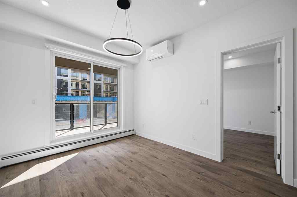 MLS® A2230875 - Unit #204 8370 Broadcast Avenue SW in West Springs Calgary, Residential