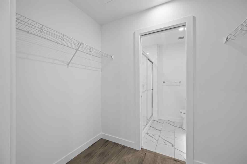 MLS® A2230875 - Unit #204 8370 Broadcast Avenue SW in West Springs Calgary, Residential