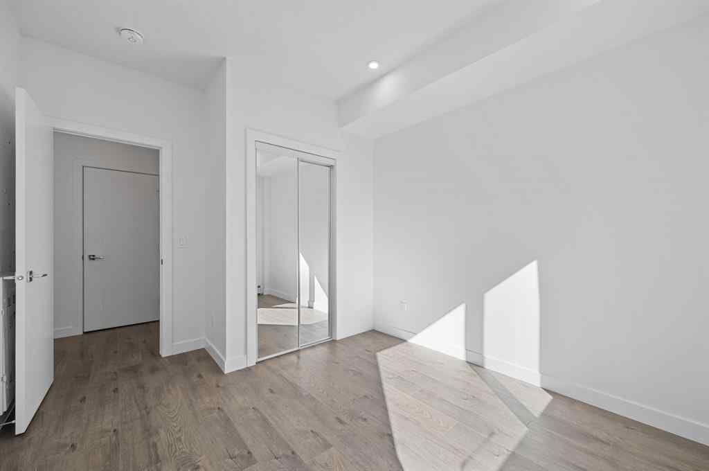 MLS® A2230875 - Unit #204 8370 Broadcast Avenue SW in West Springs Calgary, Residential
