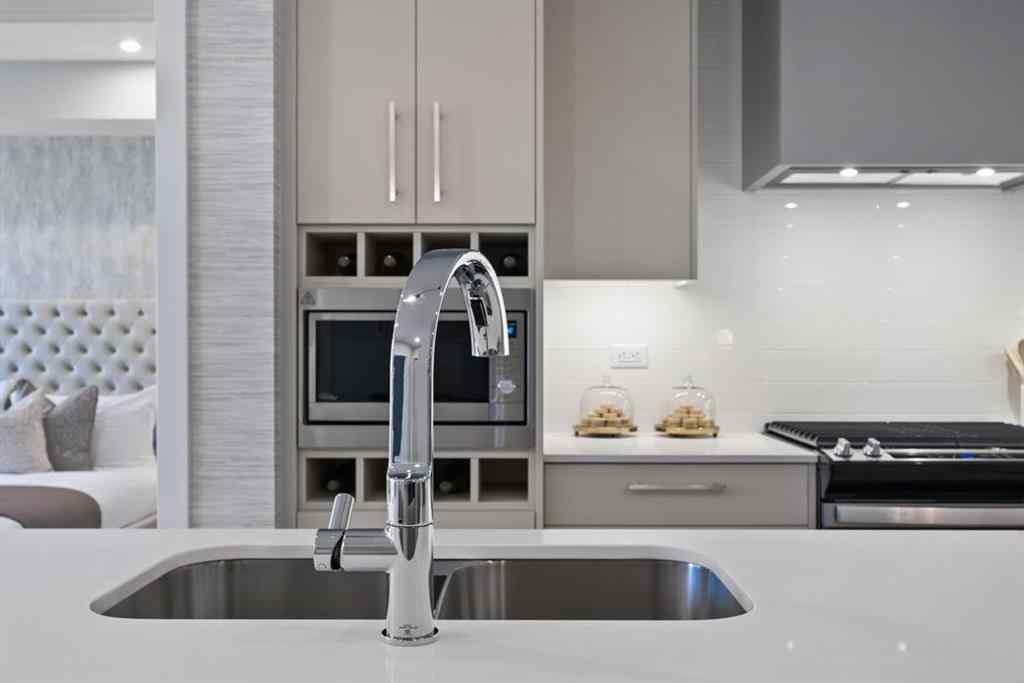 MLS® A2230878 - Unit #213 8370 Broadcast Avenue SW in West Springs Calgary, Residential