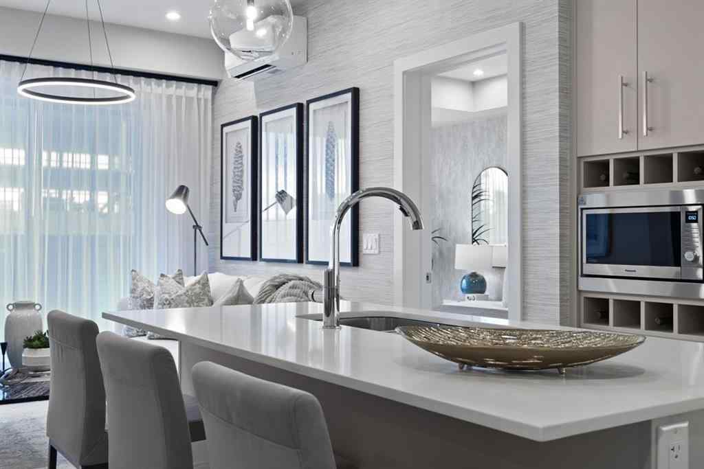 MLS® A2230878 - Unit #213 8370 Broadcast Avenue SW in West Springs Calgary, Residential