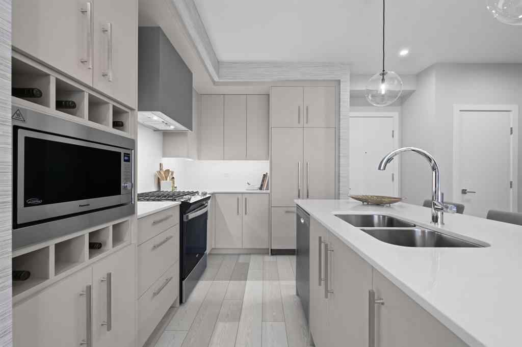 MLS® A2230878 - Unit #213 8370 Broadcast Avenue SW in West Springs Calgary, Residential