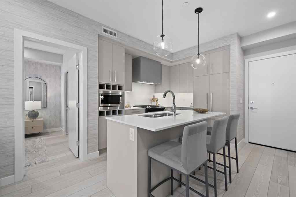 MLS® A2230878 - Unit #213 8370 Broadcast Avenue SW in West Springs Calgary, Residential
