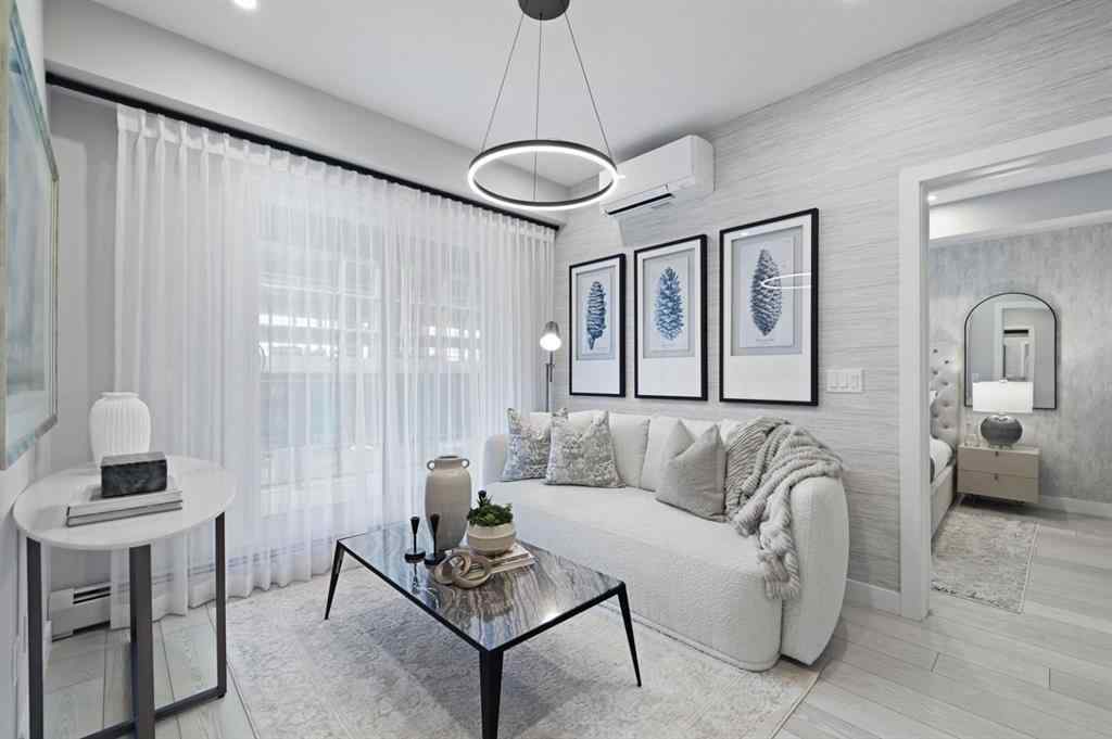 MLS® A2230878 - Unit #213 8370 Broadcast Avenue SW in West Springs Calgary, Residential
