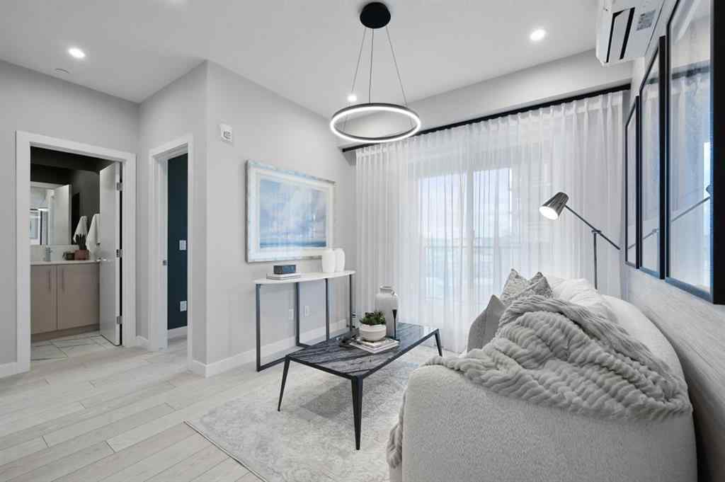 MLS® A2230878 - Unit #213 8370 Broadcast Avenue SW in West Springs Calgary, Residential