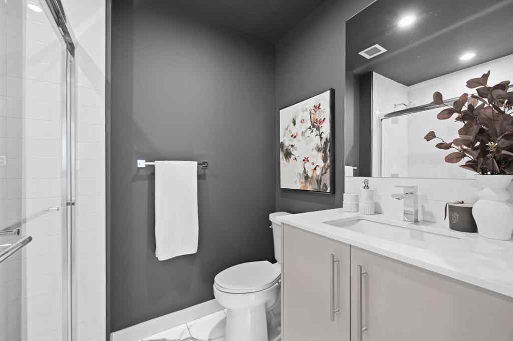 MLS® A2230878 - Unit #213 8370 Broadcast Avenue SW in West Springs Calgary, Residential