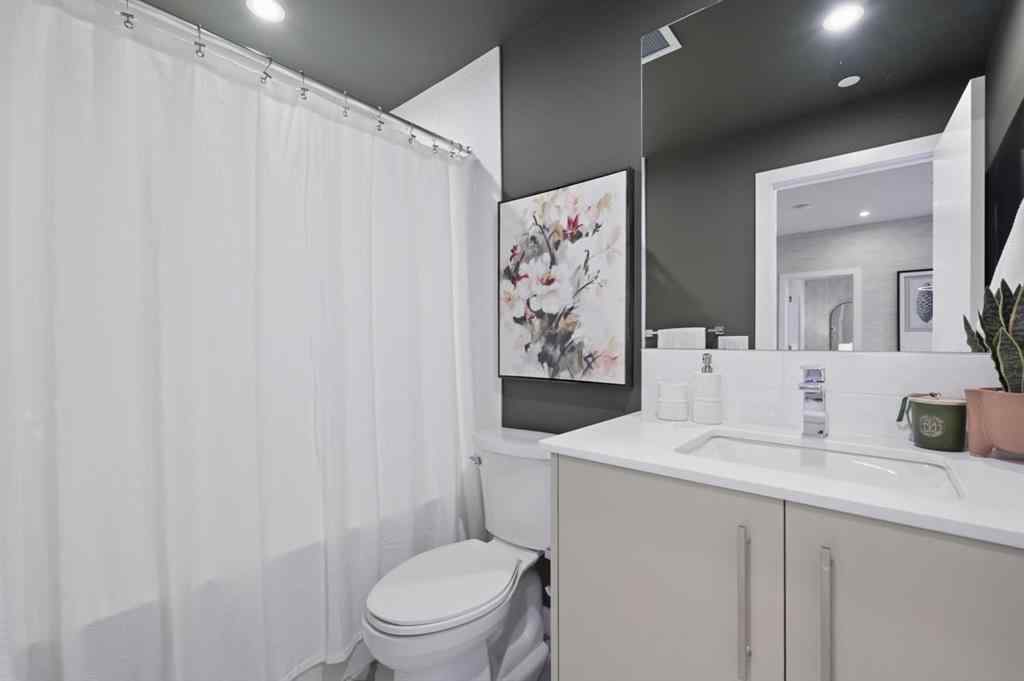 MLS® A2230878 - Unit #213 8370 Broadcast Avenue SW in West Springs Calgary, Residential