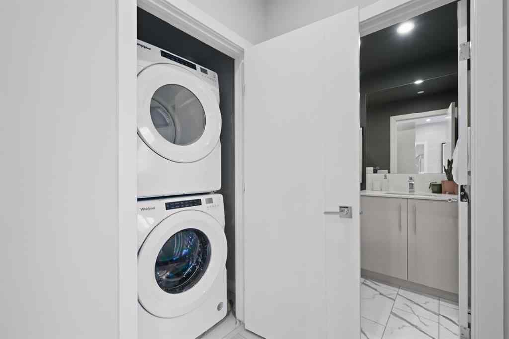 MLS® A2230878 - Unit #213 8370 Broadcast Avenue SW in West Springs Calgary, Residential