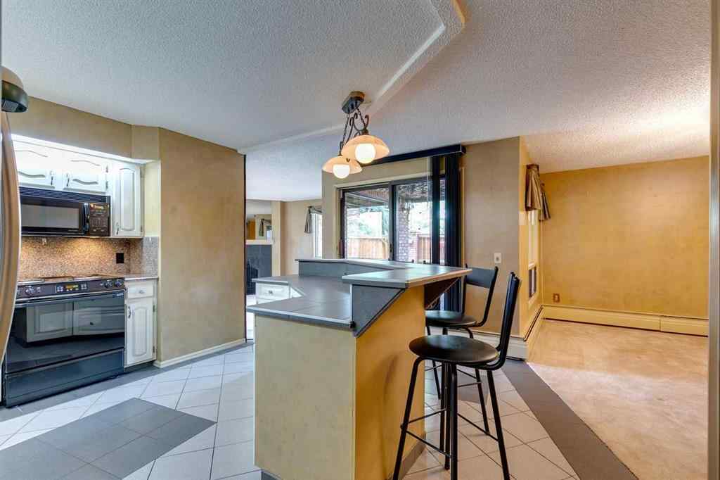 MLS® A2230886 - Unit #104 9500 Oakfield Drive SW in Oakridge Calgary, Residential