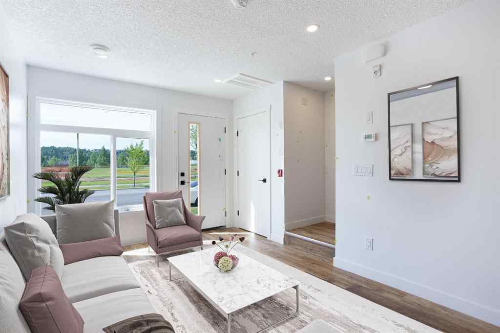 MLS® A2230904 - Unit #102 156 Park Street  in Greystone Cochrane, Residential