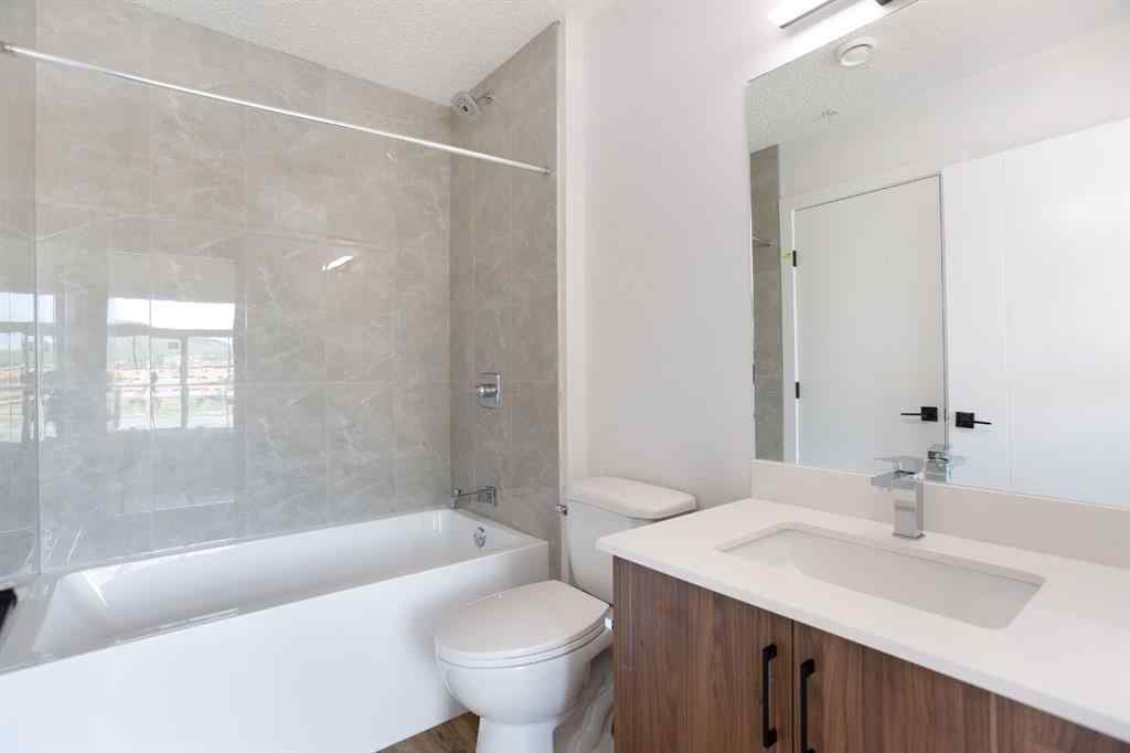 MLS® A2230904 - Unit #102 156 Park Street  in Greystone Cochrane, Residential