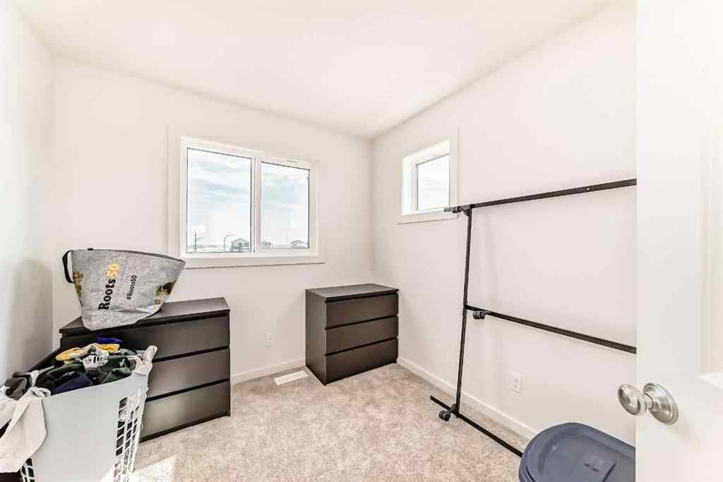 MLS® A2230937 - 200 Belmont Way SW in Belmont Calgary, Residential