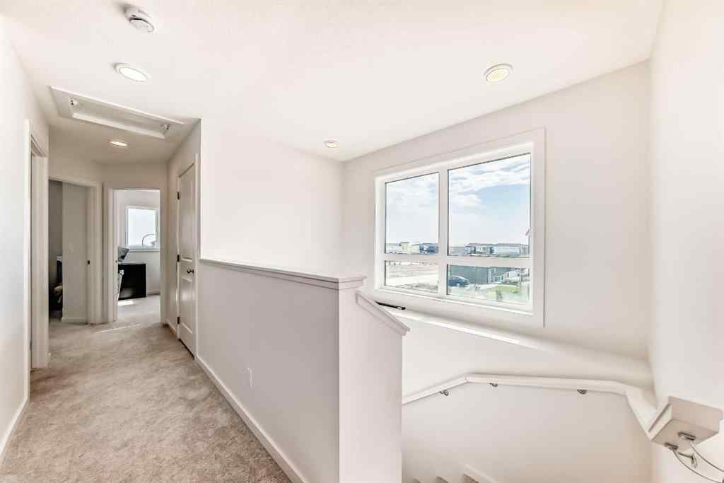 MLS® A2230937 - 200 Belmont Way SW in Belmont Calgary, Residential