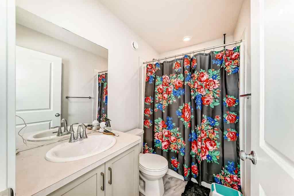 MLS® A2230937 - 200 Belmont Way SW in Belmont Calgary, Residential