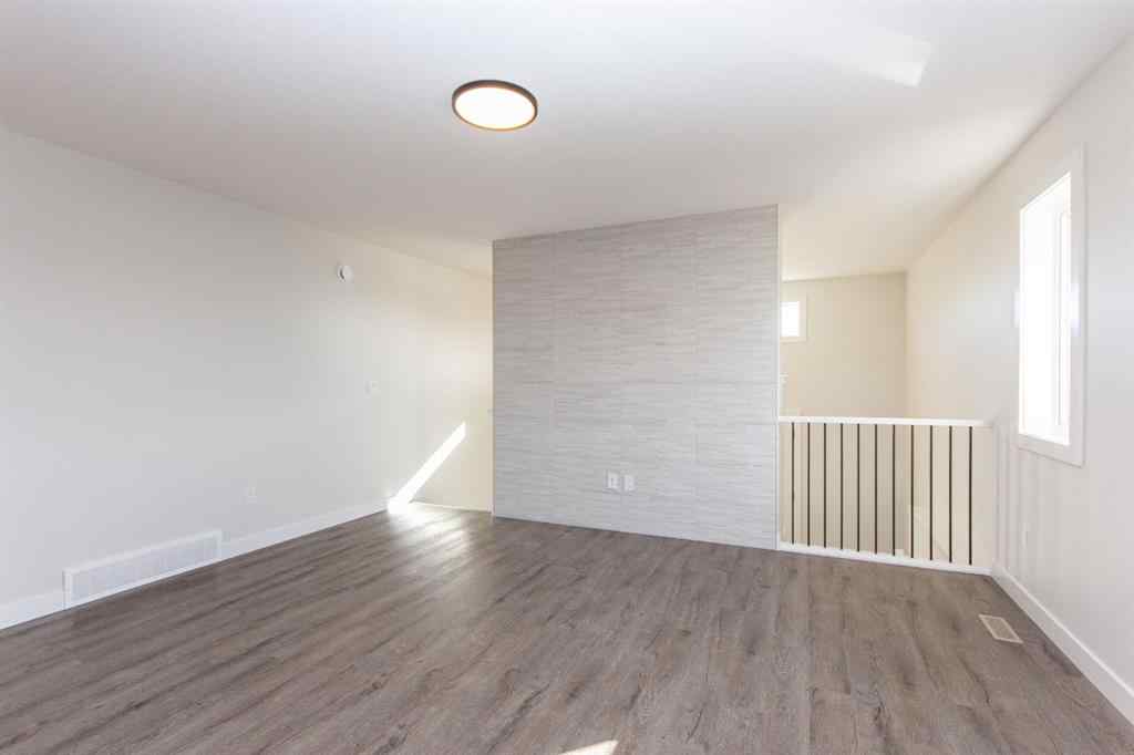 MLS® A2230958 - 52 Trinity Street  in Trinity Crossing Lacombe, Residential