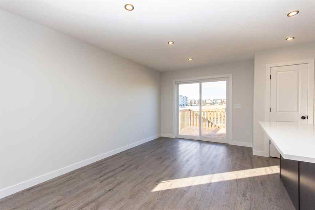 MLS® A2230958 - 52 Trinity Street  in Trinity Crossing Lacombe, Residential