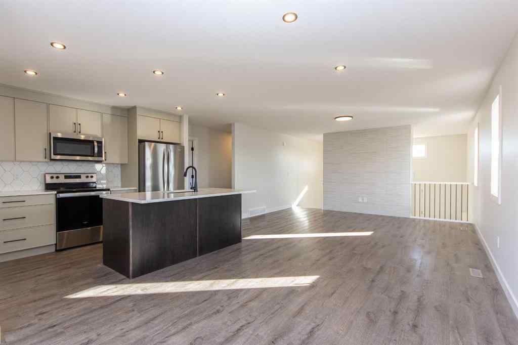 MLS® A2230958 - 52 Trinity Street  in Trinity Crossing Lacombe, Residential